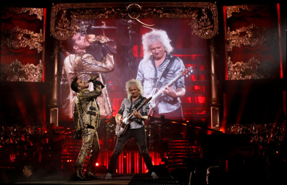 Guitarist Brian May of band Queen and singer Adam Lambert perform during The Rhapsody Tour at The Forum in Inglewood, California, U.S., July 19, 2019. REUTERS/Mario Anzuoni