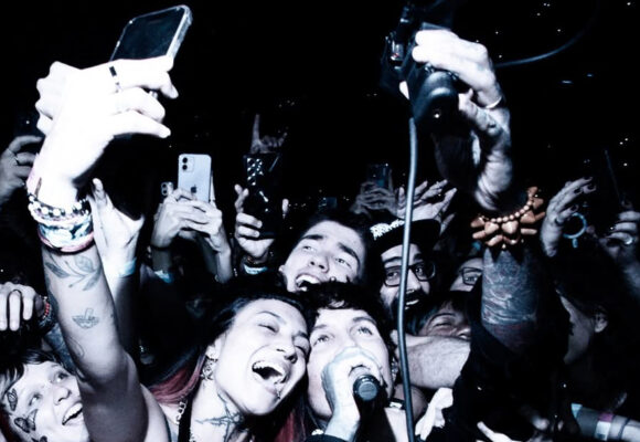 Oli Sykes Bring Me The Horizon Hit with Cell Phone
